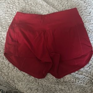 Size 8 red lululemon speed up shorts